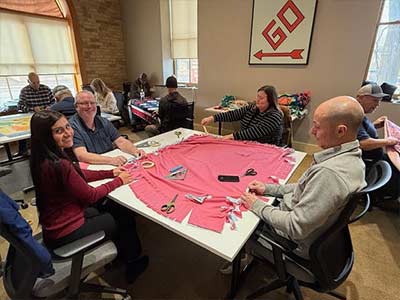 Making 50 blankets for Operation Joy and the Community Action Center