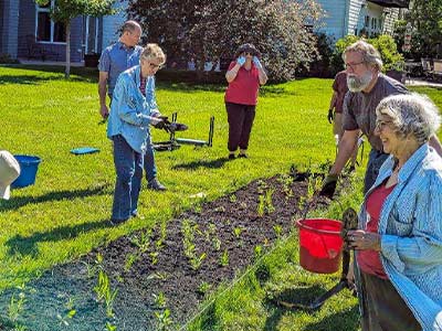 Planting a Pollinator Garden at the Village on Cannon